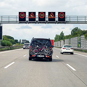 Traffic and speed limit signs on german Autobahn A2 nearby Magdeburg.  